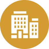 White buildings symbol in circular badge